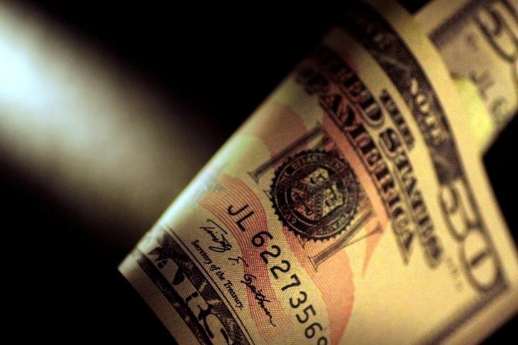 Dollar Edges Lower, But Remains Near 20-Year High