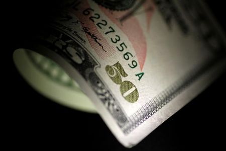 Dollar Edges Higher but Set for Losing Week; China Cuts Key Rate
