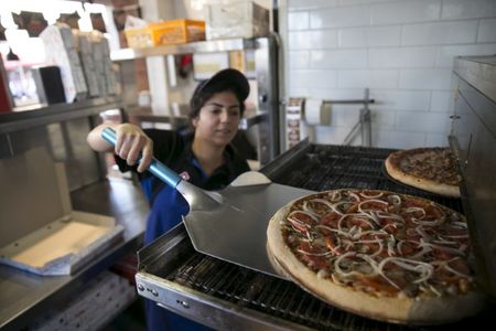 Domino's Pizza shares target raised by Argus on growth prospects