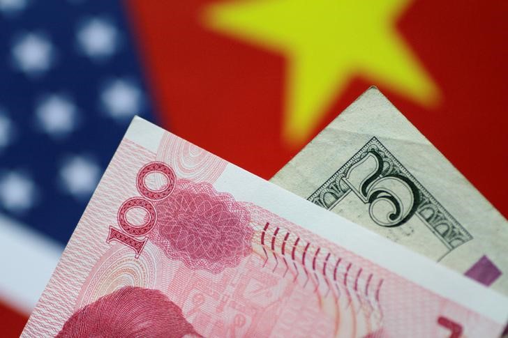 Chinese Yuan Falls, Asia FX Curbs Losses as Dollar Rally Pauses