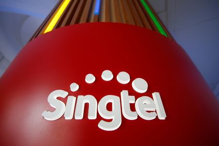 Singtel says no impending deal to divest Optus, shares sink
