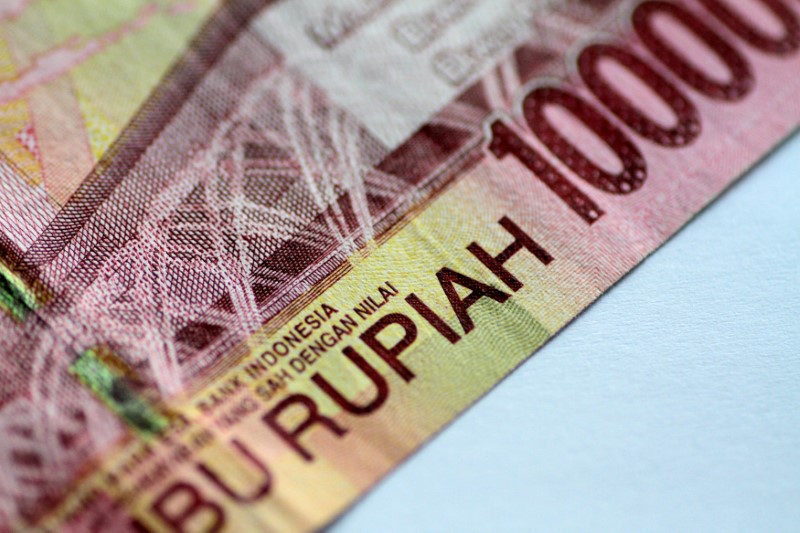 EMERGING MARKETS-Asia FX firm on hopes of low U.S. rates; Indonesia rupiah strong