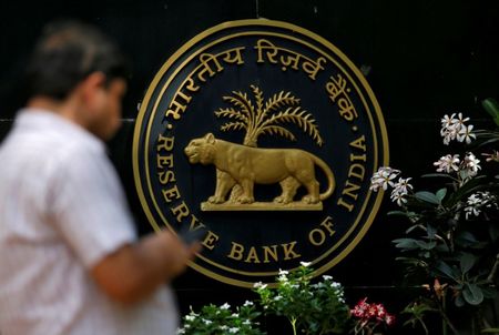 RBI keeps interest rates steady, hikes GDP outlook