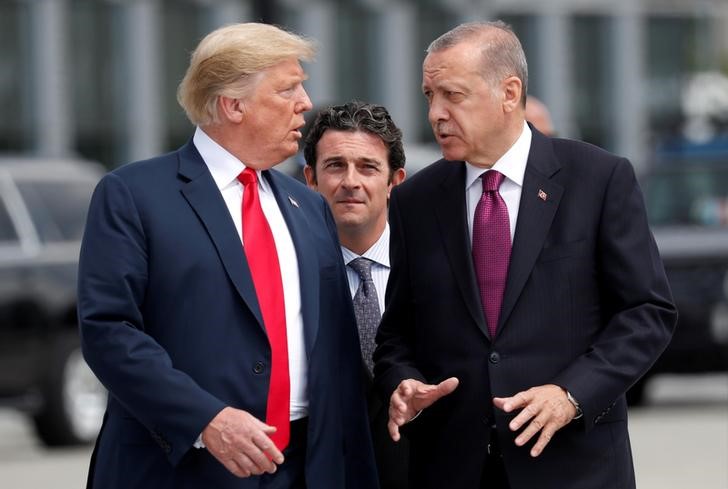 &copy; Reuters.  DETAY HABER-Erdoğan'ın haftasonu Fransa seyahatinde Trump ile görüşmesi bekleniyor; Halkbank, Suriye'deki gelişmeler masada olacak 