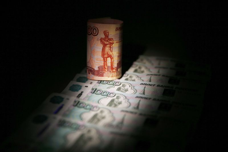 &copy; Reuters.  Russian ruble reverses rally, hits fresh lows