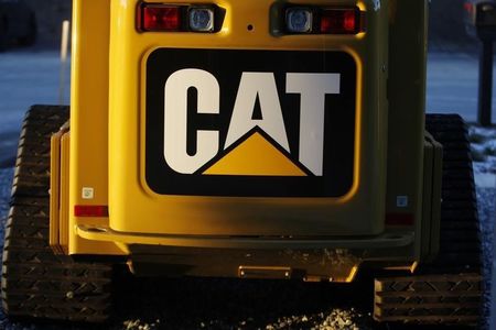 Caterpillar tops earnings expectations but sales volume declines