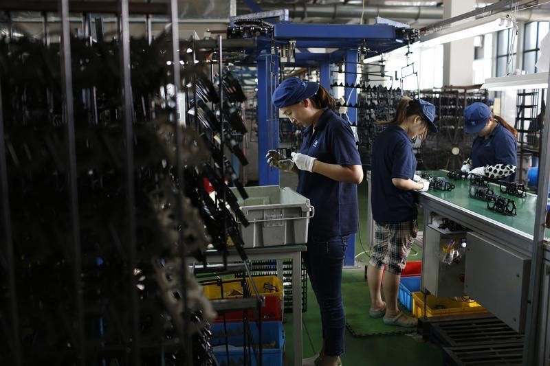 &copy; Reuters.  PMI da indústria da China vai à máxima em 4 meses mas encomendas de exportação recuam