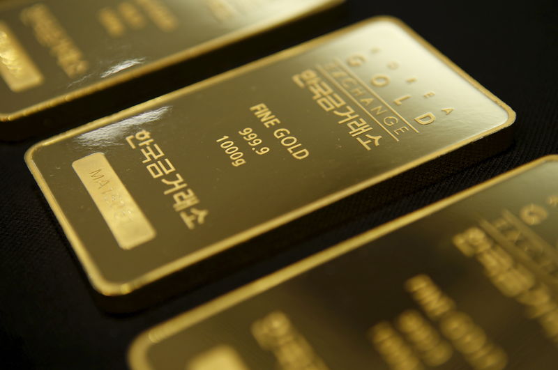 El oro, a la baja al subir el rendimiento de los bonos de EE.UU. y el dólar