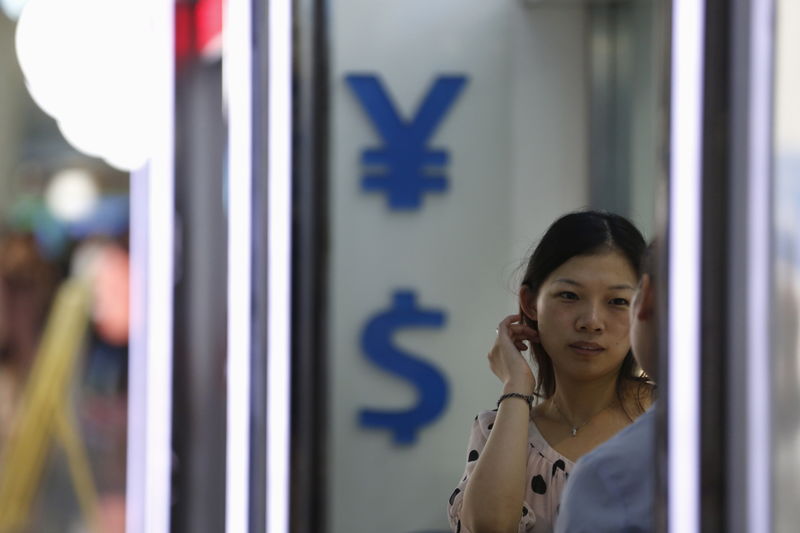 &copy; Reuters.  Китай будет сохранять стабильный курс юаня