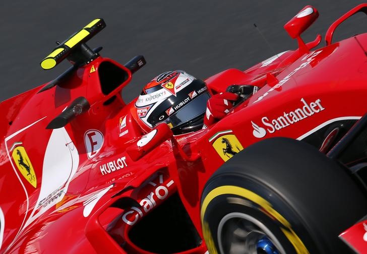 &copy; Reuters.  Motor racing-Vettel to stay with Ferrari for three more years