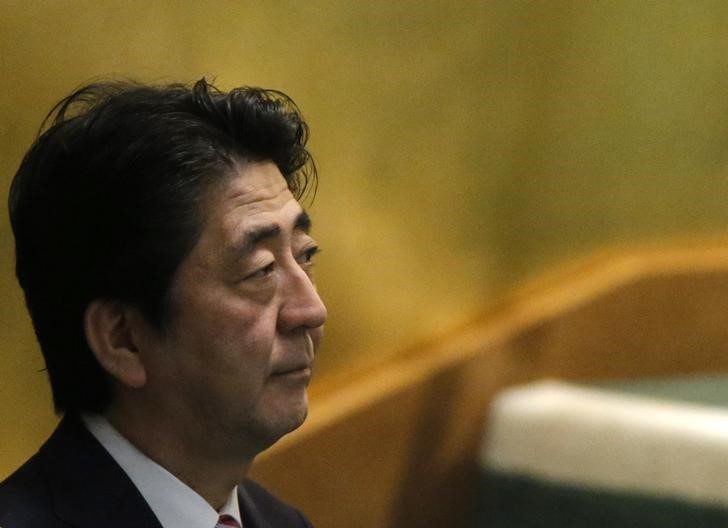 &copy; Reuters.  Japanese PM Abe: economy is top priority for new cabinet