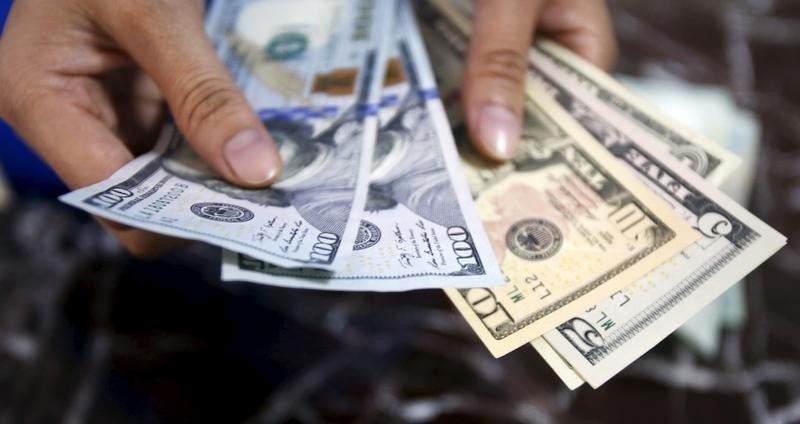 Dollar Edges Lower Ahead of Key U.S. CPI Release