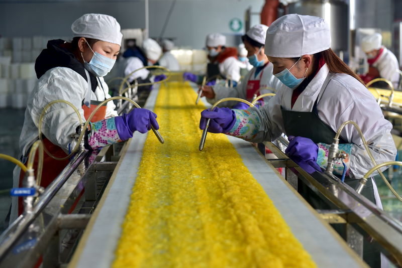 China Factory Activity Falls at Slower Pace as Covid Curbs Ease