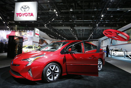 As Tesla struggles, Toyota hits record annual output, sales