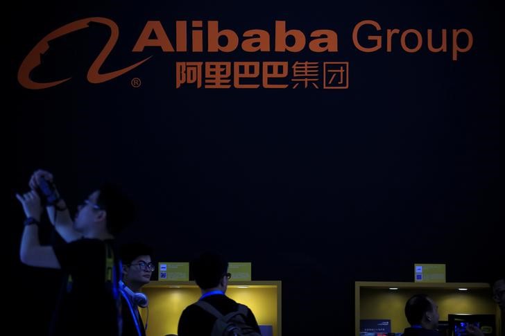 Police shooting rattles Hong Kong markets, investors count on Alibaba listing