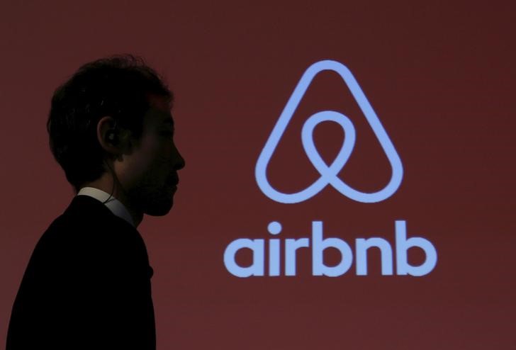 Airbnb shares surge despite mixed reviews on Wall Street