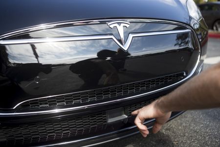 Analysts cut 3Q delivery estimates on Tesla