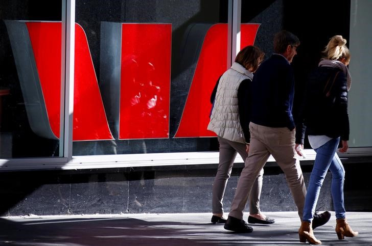 Westpac lifts Australian shares higher, miners and oil firms cap gains