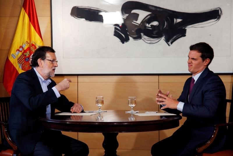 &copy; Reuters.  Rajoy garantiza, frente al anuncio de C's, que mantendrá el control del gasto