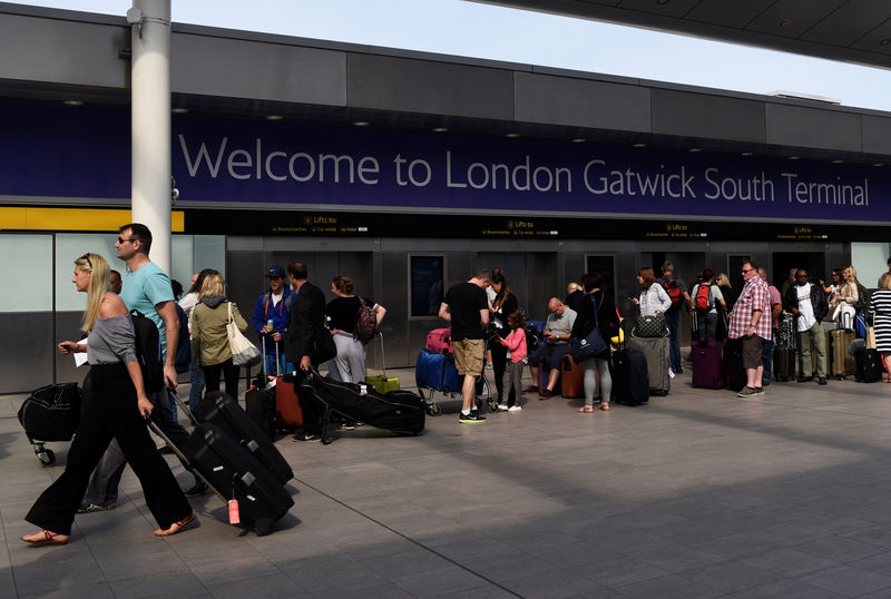 © Reuters. FILE PHOTO: General view of an entrance to the check-in area at Gatwick Airport, in Gatwick