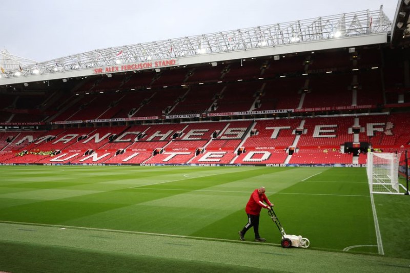 Midday movers: Manchester United, Coinbase Global, Apple and more