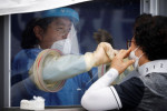 韓国のコロナ感染者、2日連続で500人超 首相「1000人に急増も」