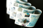 Sterling edges up as U.S. jobs data disappoints
