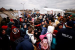 More Ukrainians flee across borders in freezing temperatures, aid effort intensifies