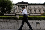 BOJ's Kuroda vows to continue monetary easing for now, focuses on wages
