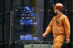 Stocks steady ahead of tech earnings as Fed drama confounds