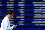 Wall Street gains, dollar firms ahead of a big week for market risk