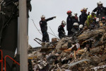 Second Florida building evacuated as death toll rises to 22 in condo tower collapse