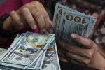 Dólar cai com expectativa por corte de juros nos EUA e fala de Haddad