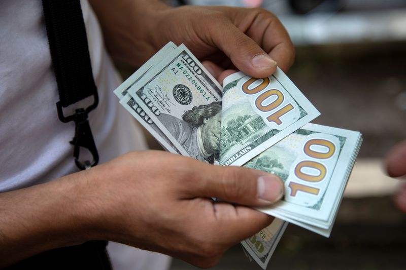Dollar Up, Investors Wait for Latest Fed Policy Decision