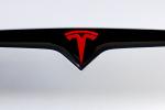 Tesla shares slip after third-quarter profit falls short of estimates