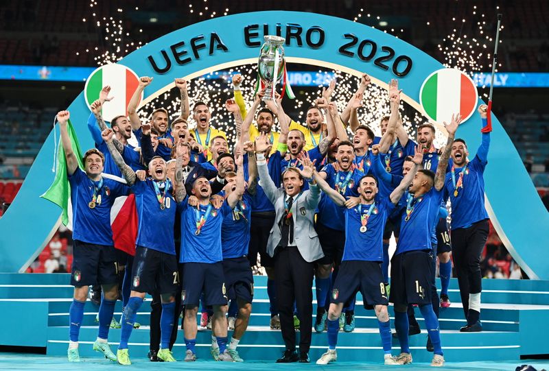 &copy; Reuters. Soccer Football - Euro 2020 - Final - Italy v England - Wembley Stadium, London, Britain - July 11, 2021  Italy celebrate with the trophy after winning Euro 2020 Pool via REUTERS/Michael Regan