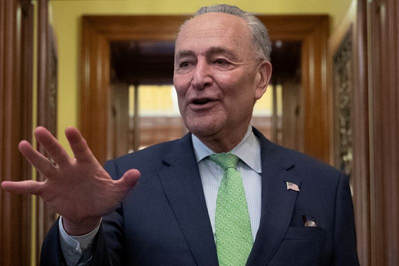 &copy; Reuters. FILE PHOTO: Senate Majority Leader Chuck Schumer (D-NY) speaks to news reporters following the announcement of a bipartisan deal on infrastructure, on Capitol Hill in Washington, U.S., June 24, 2021.  REUTERS/Tom Brenner/File Photo