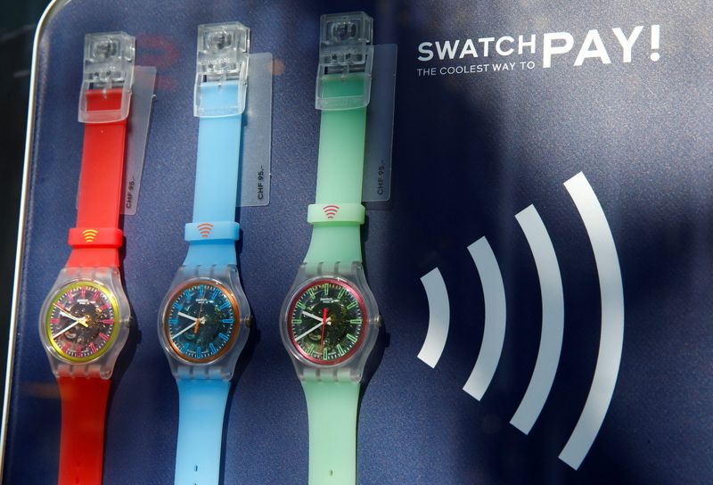 &copy; Reuters. SwatchPAY! watches, usable for pay-by-the-wrist contactless payments, are seen at the shop of Swiss watch manufacturer Swatch in Zurich, Switzerland April 14, 2021. REUTERS/Arnd Wiegmann/File Photo 