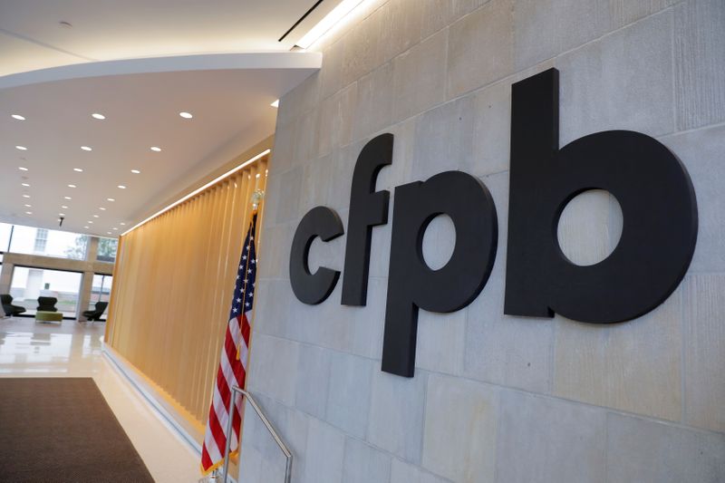 &copy; Reuters. FILE PHOTO: Signage is seen at the Consumer Financial Protection Bureau (CFPB) headquarters in Washington, D.C., U.S., May 14, 2021. REUTERS/Andrew Kelly