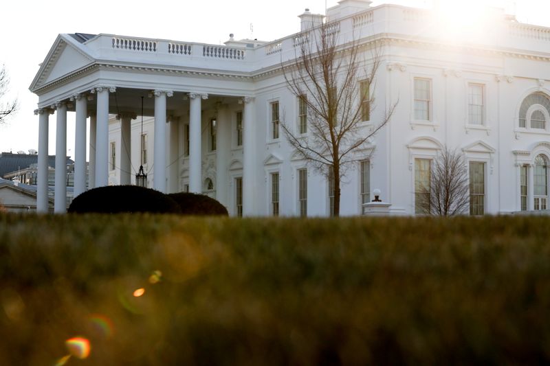 &copy; Reuters. FILE PHOTO: A general view of the sun rising behind the White House in Washington, U.S. January 22, 2021.  REUTERS/Jonathan Ernst