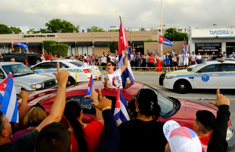 &copy; Reuters. FILE PHOTO: People rally in solidarity with protesters in Cuba, in Little Havana neighborhood in Miami, Florida, U.S. July 12, 2021.   REUTERS/Maria Alejandra Cardona/File Photo