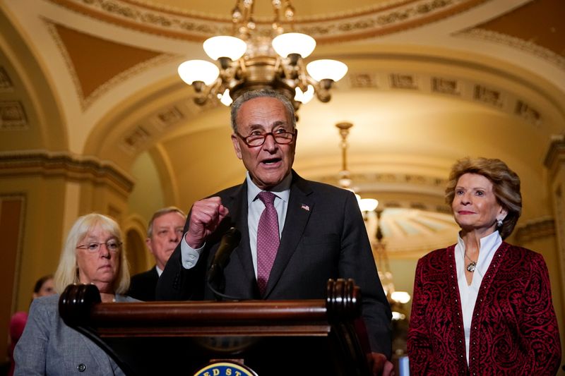 © Reuters. U.S. Senate Majority Leader Chuck Schumer (D-NY) is flanked by Senators' Patty Murray (D-WA), Dick Durbin (D-IL) and Debbie Stabenow (D-MI) as he talks to reporters following the Senate Democrats weekly policy lunch at the U.S. Capitol in Washington, U.S., July 13, 2021.  REUTERS/Elizabeth Frantz