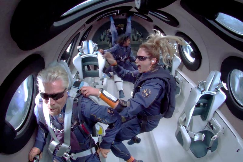 &copy; Reuters. FILE PHOTO: Billionaire Richard Branson makes a statement as crew members Beth Moses and Sirisha Bandla float in zero gravity on board Virgin Galactic's passenger rocket plane VSS Unity after reaching the edge of space above Spaceport America near Truth o