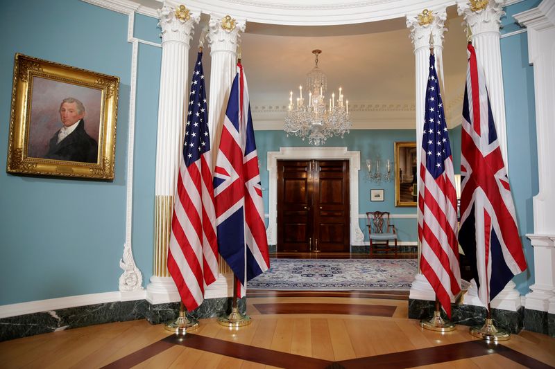 &copy; Reuters. FILE PHOTO: The flags of the United States and the United Kingdom stand after bi-lateral photo between U.S. Secretary of State Rex Tillerson and British Foreign Minister Boris Johnson was cancelled at the State Department in Washington, U.S. March 22, 201