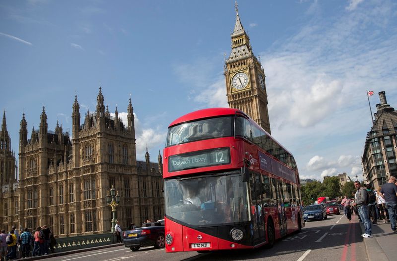&copy; Reuters. FILE PHOTO: A Go-Ahead bus crosses Westminster Bridge in London, Britain,  August 29, 2015. REUTERS/Neil Hall