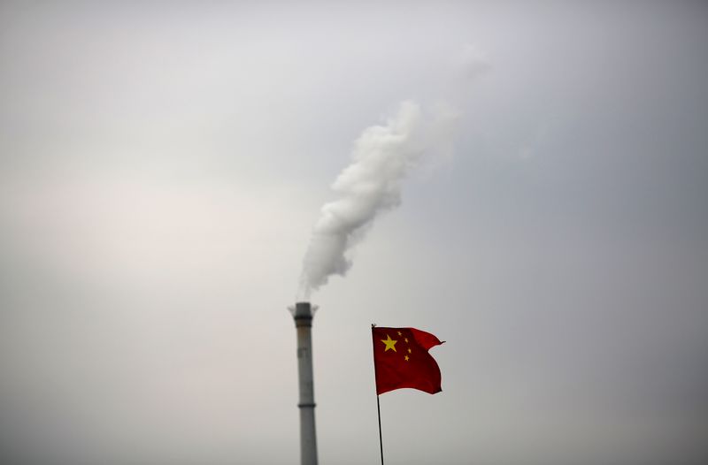 &copy; Reuters. 　７月１４日、中国生態環境省は、全国的な炭素の排出量取引制度（ＥＴＳ）を月内に正式に開始すると発表した。写真は北京で２０１４年１１月撮影（２０２１年　ロイター／Kim Kyung-Hoon