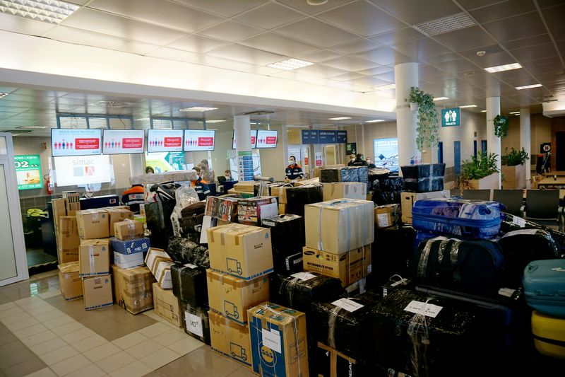 &copy; Reuters. A luggage stack is seen near check-in before flight to Moscow in Prague international airport, Czech Republic April 19, 2021. REUTERS/Jiri Skacel