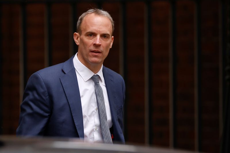 &copy; Reuters. FILE PHOTO: Britain's Foreign Secretary Dominic Raab walks outside Downing Street in London, Britain, May 27, 2021. REUTERS/John Sibley