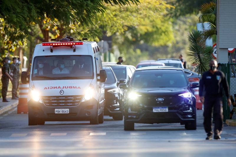 &copy; Reuters. A presidential convoy with an ambulance transporting Brazil's President Jair Bolsonaro leaves the armed forces hospital (HFA) in Brasilia, Brazil July 14, 2021. REUTERS/Adriano Machado