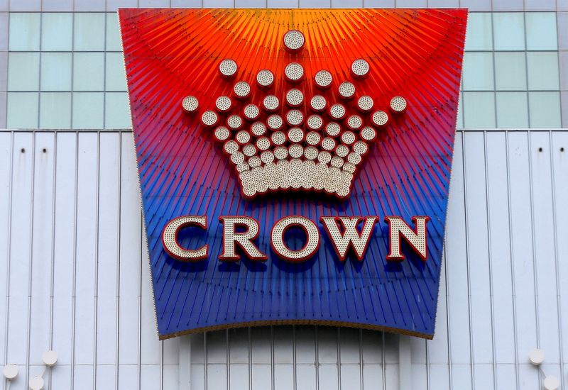 &copy; Reuters. FILE PHOTO: The logo of Australian casino giant Crown Resorts Ltd adorns the hotel and casino complex in Melbourne, Australia, June 13, 2017.  REUTERS/Jason Reed